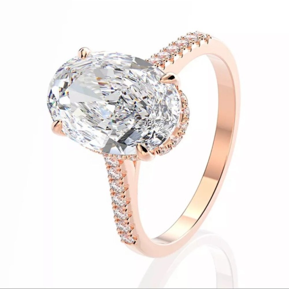 Beautiful 925 sterling silver rose gold 3ct oval cubic zirconia engagement ring.
